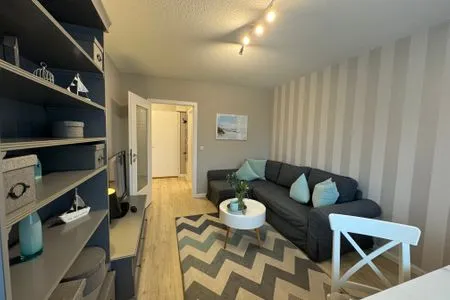 Wohnzimmer Ferienwohnung im Haus Nordland App 118 (Hund)