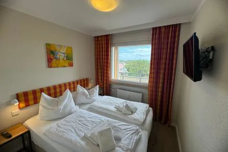 Schlafzimmer Ferienwohnung im Haus Nordland App 88