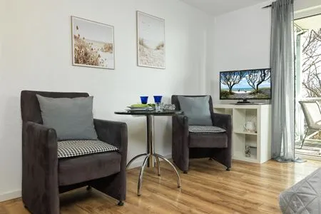 Wohnzimmer Residenz am Yachthafen Mann un Fru