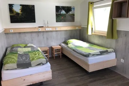 Schlafzimmer Mathilde - Lastering Ferienhäuser & Apartments