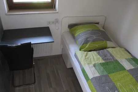 Schlafzimmer Wacholderbusch - Lastering Ferienhäuser & Apartments