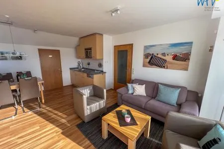 Wohnzimmer Ferienhaus Upholmstr. Ferienwohnung Düne 116