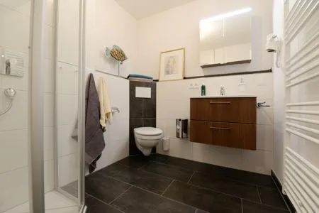 Badezimmer Apartment Gartenblick 7/6 EG mit überdachter Terrasse