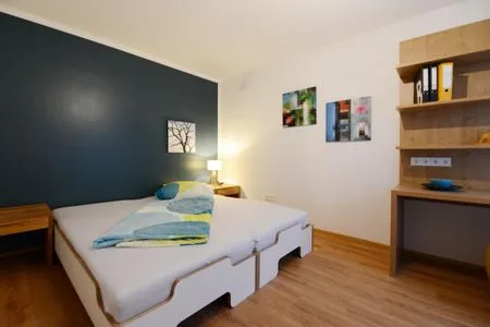 Schlafzimmer Apartment mit überdachtem Balkon 7/7 OG
