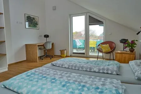 Schlafzimmer EntdeckerFERIEN Apartment 7/7 DG Bergblick mit großem Balkon