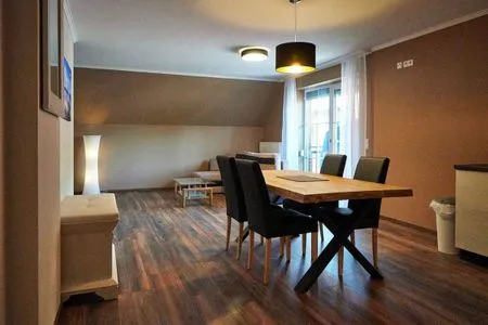 Wohnzimmer Wohnung 5 - Suite Tyr - mit großem Balkon