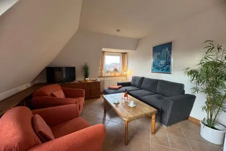 Wohnzimmer Ferienwohnung im DikWai Fewo A in Rantum