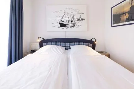 Schlafzimmer (OST29) Ferienwohnung "Komoran"