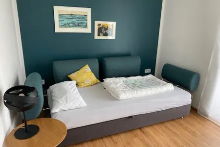 Wohnzimmer Apartment Gartenblick 7/4 EG mit überdachter Terrasse