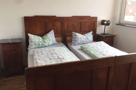 Schlafzimmer Apartment 7b ARTS mit überdachtem Balkon