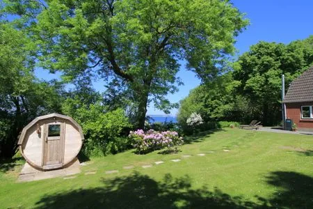 Garten mit Meerblick und FassSauna Strandhaus am Mühlendamm