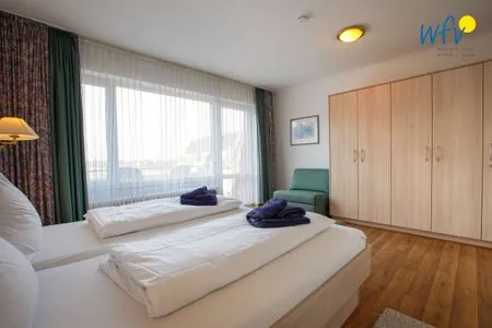 Schlafzimmer Holiday Residenz II Ferienwohnung 51