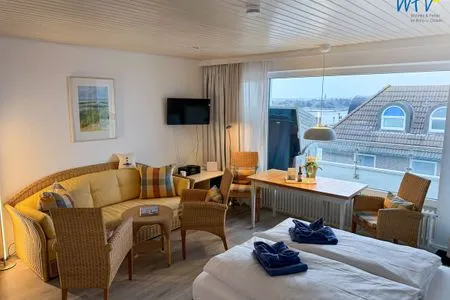 Wohn- und Schlafzimmer Haus Poseidon Ferienwohnung 5.2