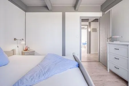 Schlafzimmer Ferienwohnung Deich & Chill Pellworm