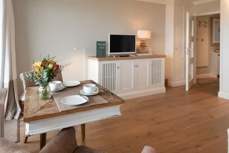 Wohnzimmer Dünenhof zum Kronprinzen, Seafront, App. 61