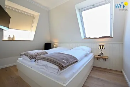 Schlafzimmer Villa Petersen Ferienwohnung Himmel & Meer