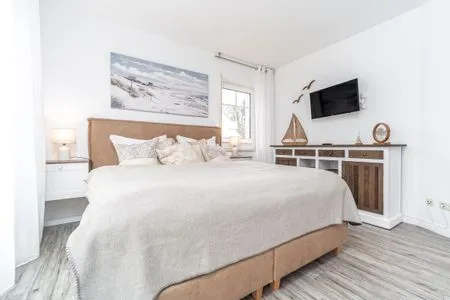 Schlafzimmer mit Doppelbett Parkresidenz am Hafen Wohnung HF 23 - "Viento"