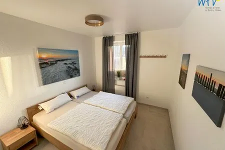 Schlafzimmer Haus Dünenblick Ferienwohnung 6