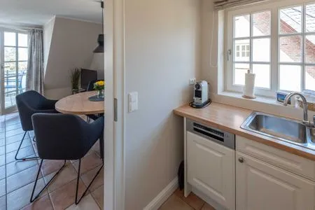 in der Küche steht eine Nespressomaschine Haus Carmen App. 12