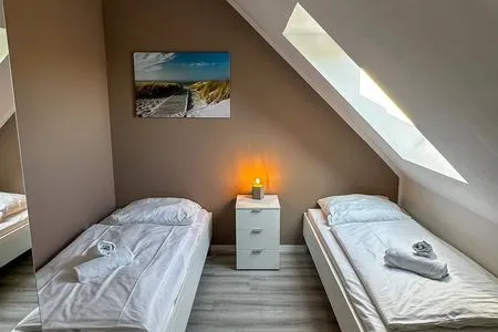 Schlafzimmer Haus Windland Ferienwohnung 10