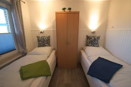 Schlafzimmer Ferienwohnung Strandperle
