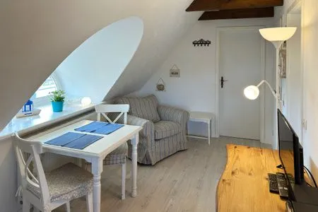 Wohnzimmer Hüs Sanskiin Ferienwohnung *Driiwholt*