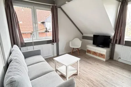 Wohnzimmer Ferienwohnung Pellwormer Inselperle