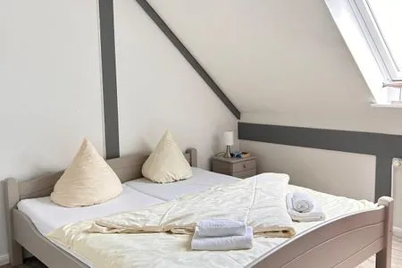Schlafzimmer Ferienwohnung Moin Moin & Meer Pellworm