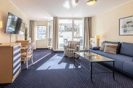 Ferienwohnung Deichperle Aparthotel Zingst - Wohnzimmer  Deichperle