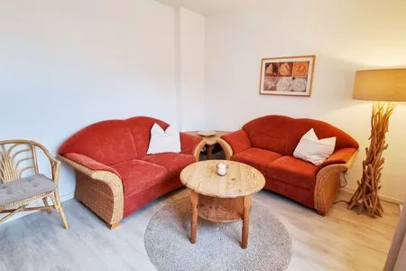 Wohnzimmer Ferienwohnung "Achtern Diek 2" 1. Reihe an der Ostseeküste