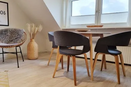 Wohnzimmer Ferienwohnung "Achtern Diek 3" 1. Reihe an der Ostseeküste