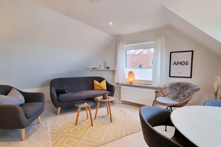 Wohnzimmer Ferienwohnung "Achtern Diek 3" 1. Reihe an der Ostseeküste