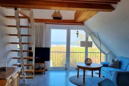 Wohnzimmer Ferienwohnung "Achtern Diek 4" 1. Reihe an der Ostseeküste