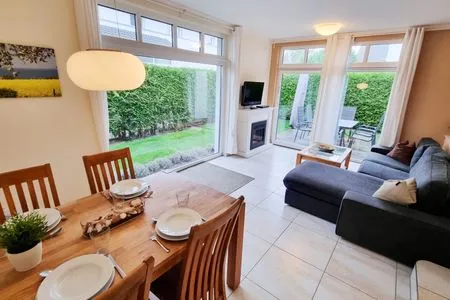 Wohnzimmer Ferienwohnung "Baltic Sunrise" mit Garten an der Ostseeküste