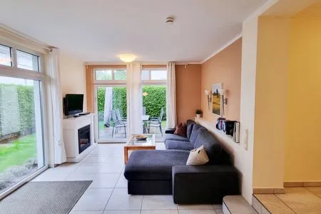 Wohnzimmer Ferienwohnung "Baltic Sunrise" mit Garten an der Ostseeküste