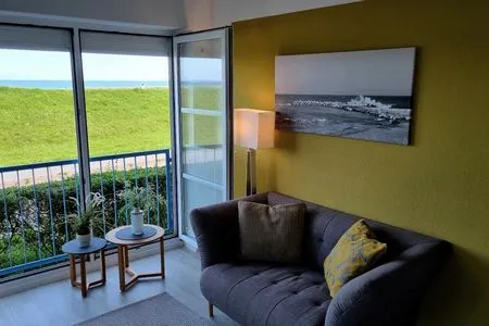 Wohnzimmer Ferienwohnung "Baltic Sunset" in 1. Reihe zum Ostseestrand