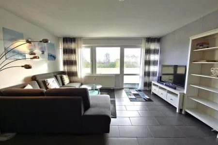 Wohnzimmer Ferienwohnung "Deichwind" in Holm an der Ostsee