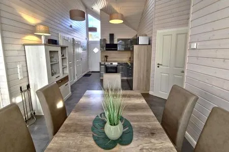 Wohnzimmer Ferienhaus "Lönneberga" im Ferienpark Holm an der Ostsee