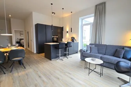 Wohnzimmer Ferienwohnung "Strandgut" in 1. Reihe an der Ostseeküste