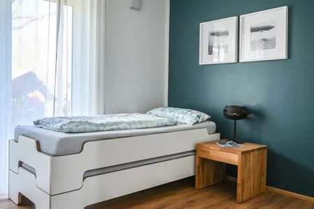 Schlafzimmer Apartment 7/7 OG - überdachter Balkon