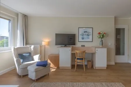 Ferienwohnung Herzmuschel Blick auf den Arbeitsplatz im Wohnbereich  Herzmuschel
