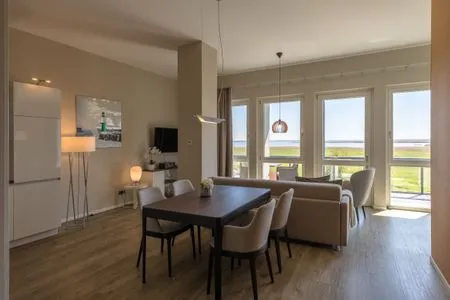 Ferienwohnung Sonnengott in Wustrow - Blick in den offenen Wohnberreich  Sonnengott