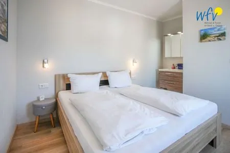 Schlafzimmer Apartmenthaus Roberta Ferienwohnung Seehund