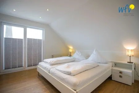 Schlafzimmer Apartmenthaus Roberta Ferienwohnung Meerblick