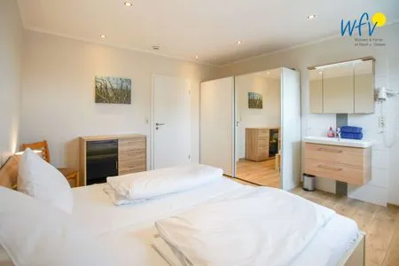 Schlafzimmer Apartmenthaus Roberta Ferienwohnung Borkum Riff