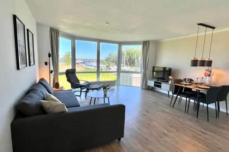 Wohnzimmer Moderne Ferienwohnung N°9 Stexwig mit Panorama Schleiblick