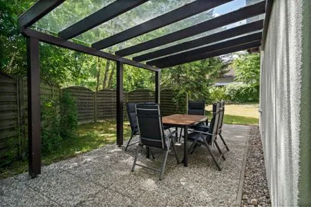 Ferienhaus Zander Fuenfseen überdachte Terrasse  Zander