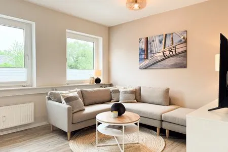 Wohnzimmer Ferienwohnung 'Borbystrand' in Eckernförde – Strandnah und familienfreundlich