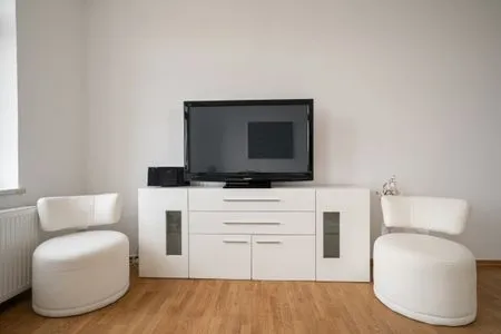 Ferienwohnung SeaView Malchow Wohnzimmer mit TV-Wand  SeaView