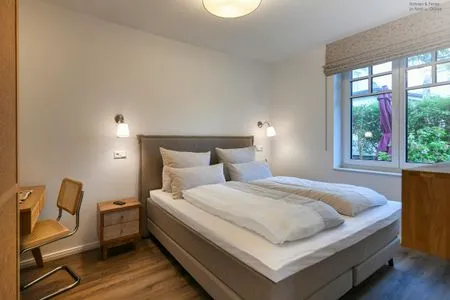 Schlafzimmer Haus Casper Ferienwohnung Strandstuuv